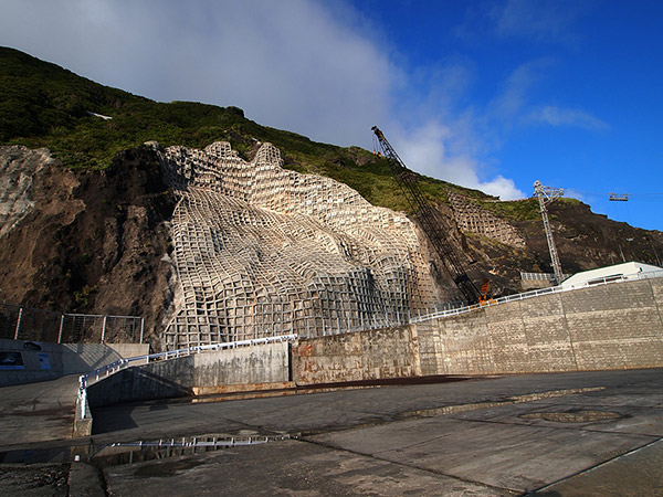 Vast grounds against the background of a cliff